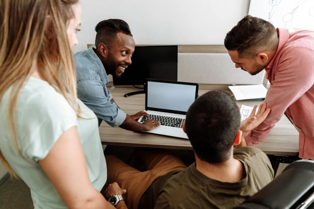 Award-winning project management consultancy team collaboration meeting for Canadian businesses at Pearl Lemon Consulting office