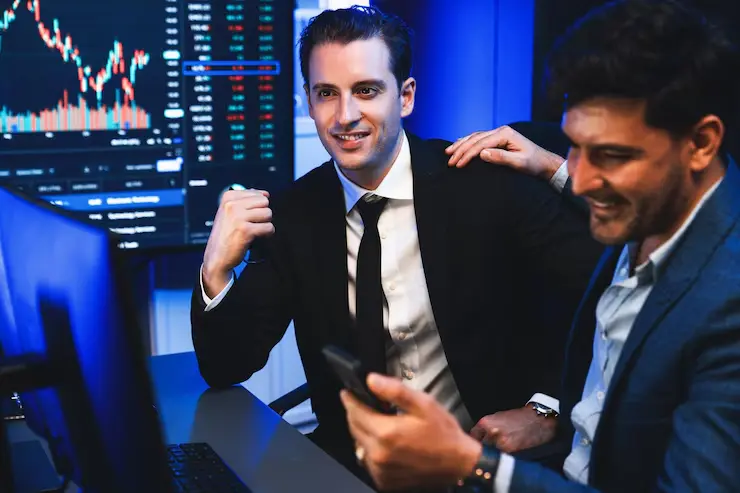 Business professionals discussing expertise in investment markets and financial strategies in Canada.