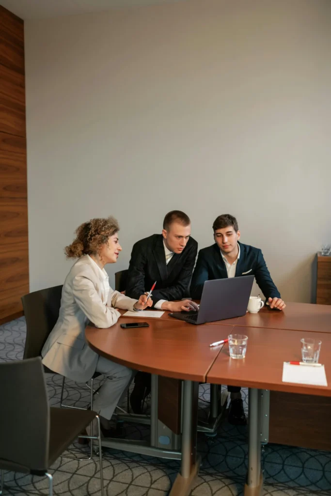 Business professionals discussing revenue architecture and monetization strategy.